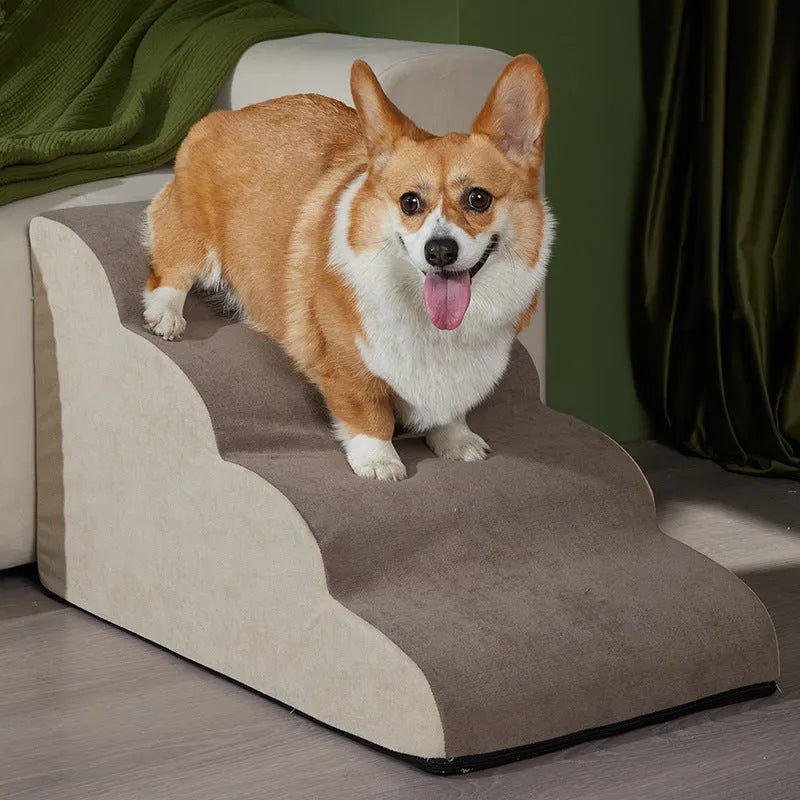 Brown foam pet ramp stairs with non-slip surface on a carpeted floor