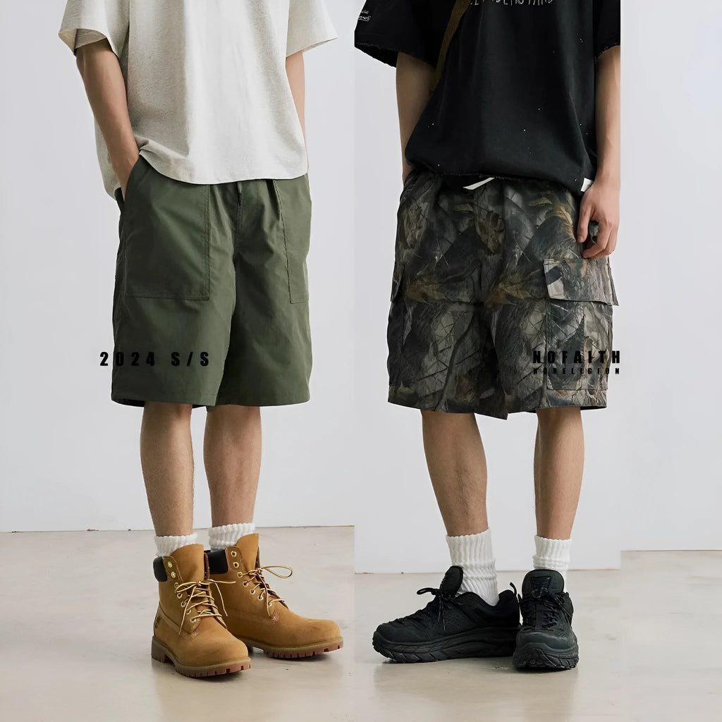 Loose casual straight-leg denim shorts in army green with zip placket closure