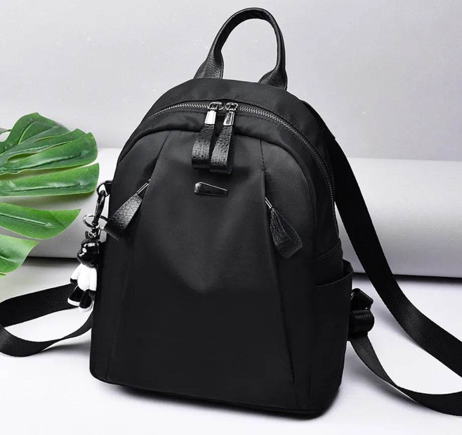 Medium wine red Oxford cloth rucksack with double straps and external digging pocket