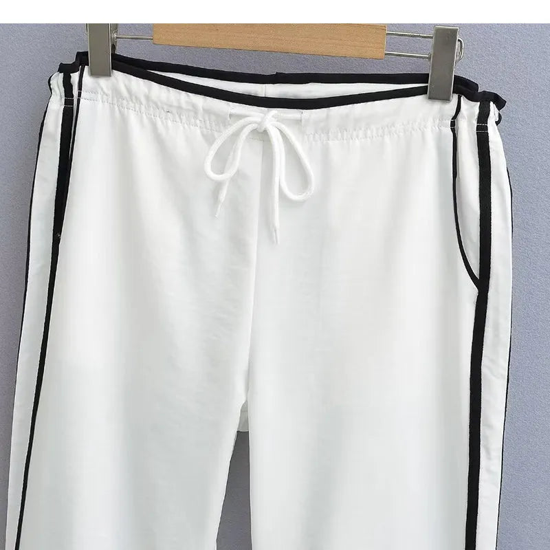 Women's loose straight-leg pants with ribbon parallel bar contrast detailing in navy blue colour option