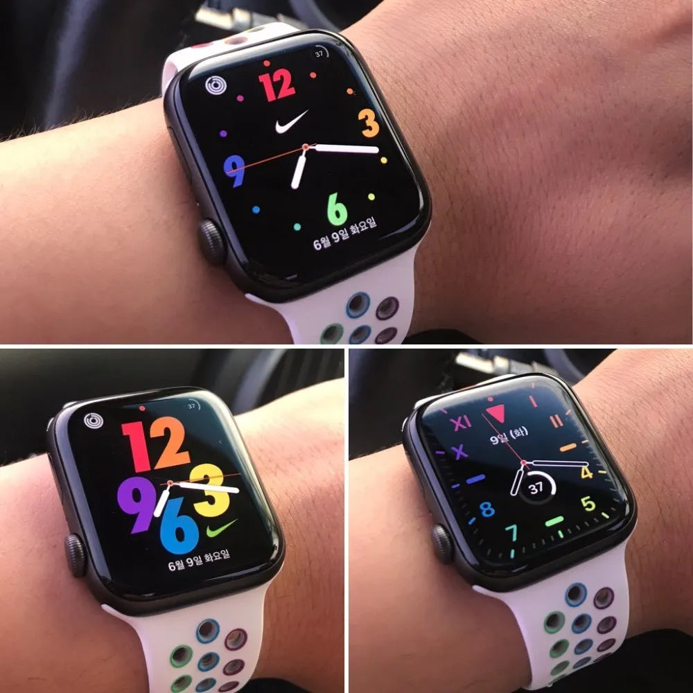 Silicone sports wristband with an adjustable buckle clasp in black, rainbow, or white.