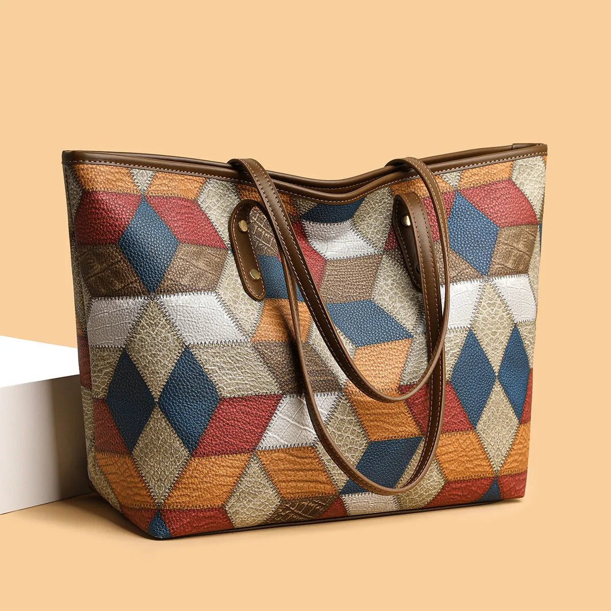 Women's large capacity PVC shoulder handbag in blue brown colour with sandwich pocket design