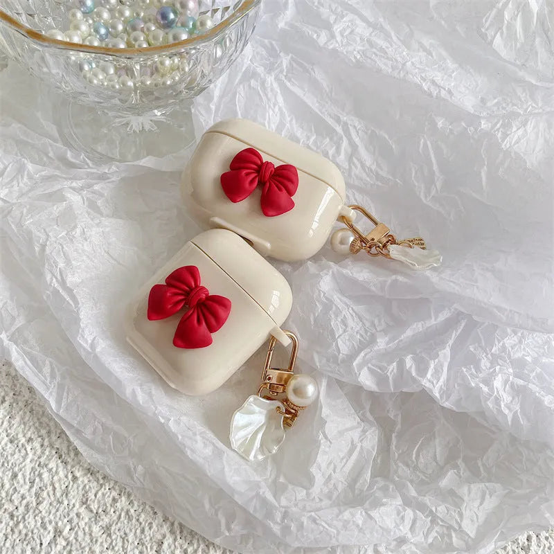 Beige red bow shell TPU earphone case for AirPods with clamshell closure