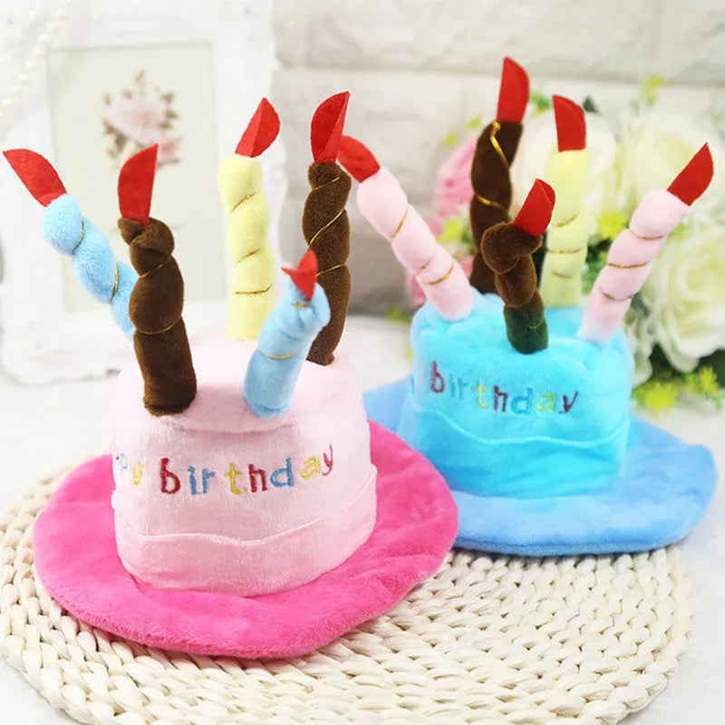 Blue or pink dog birthday hat with elastic chin strap measuring 21x15x6.5cm