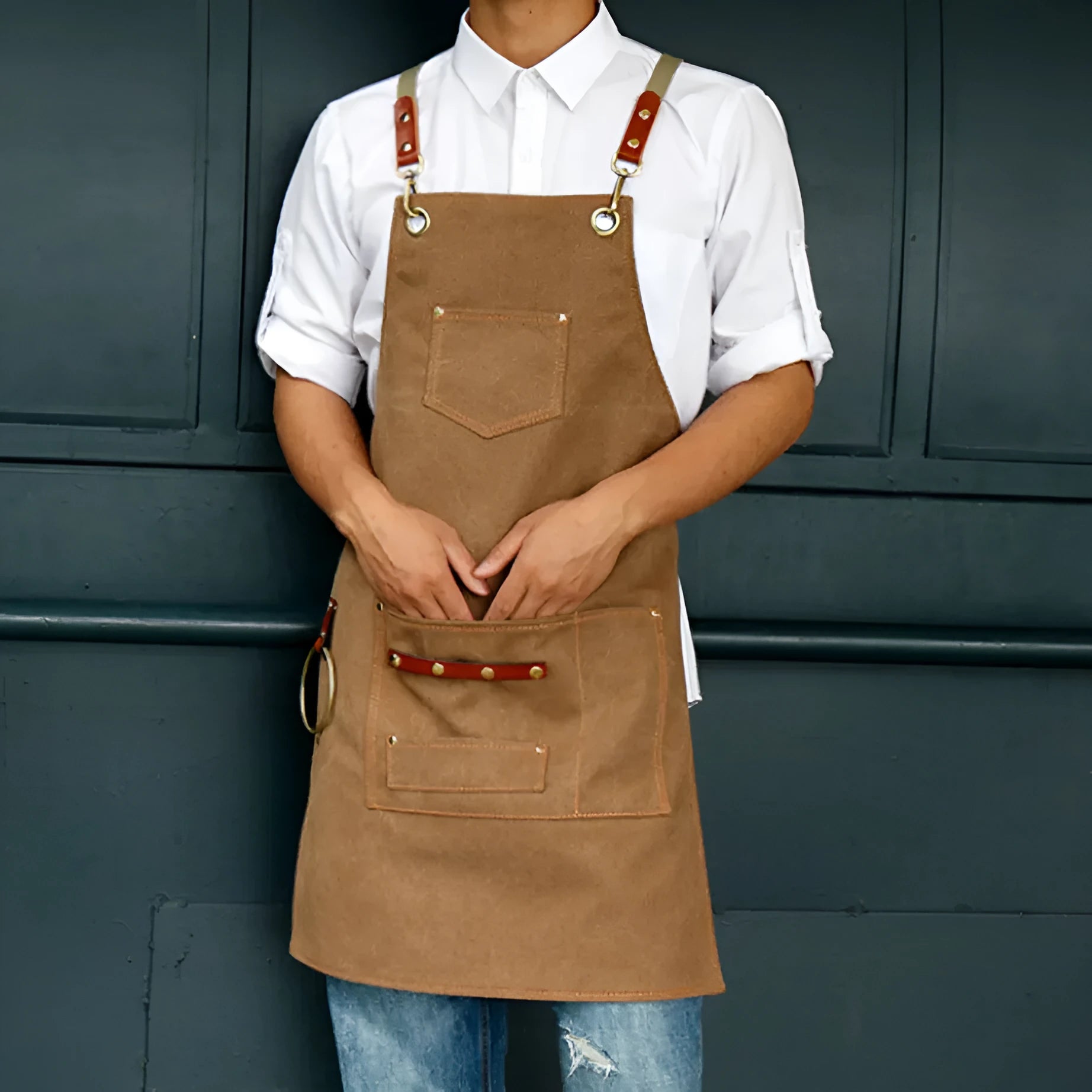 Canvas apron with cross back straps in camel colour for café or baking work