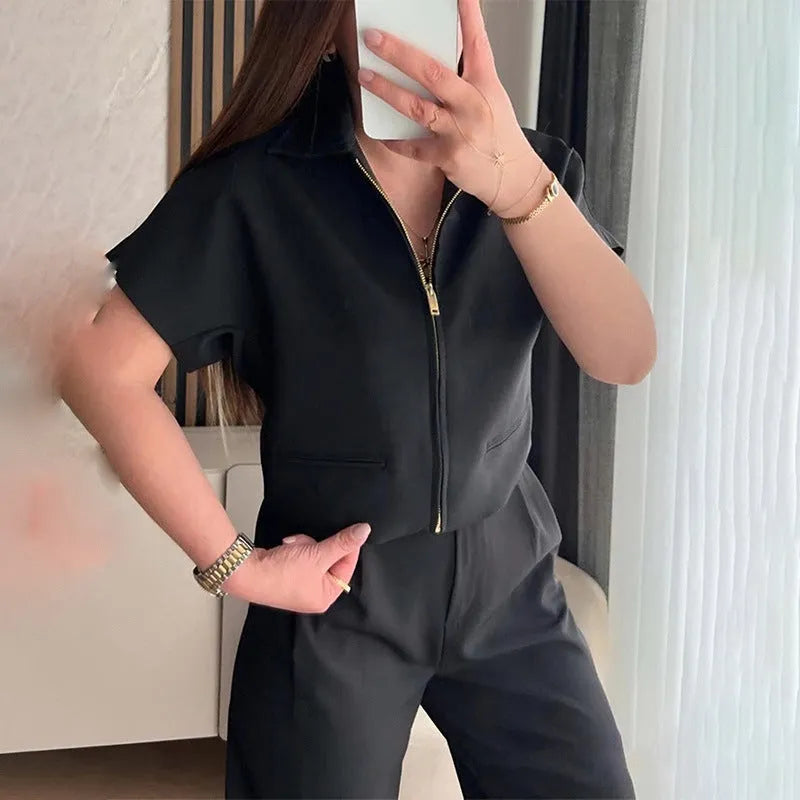 Loose-fit short-sleeve casual top in polyester, shown in white, black, and yellow colour options.