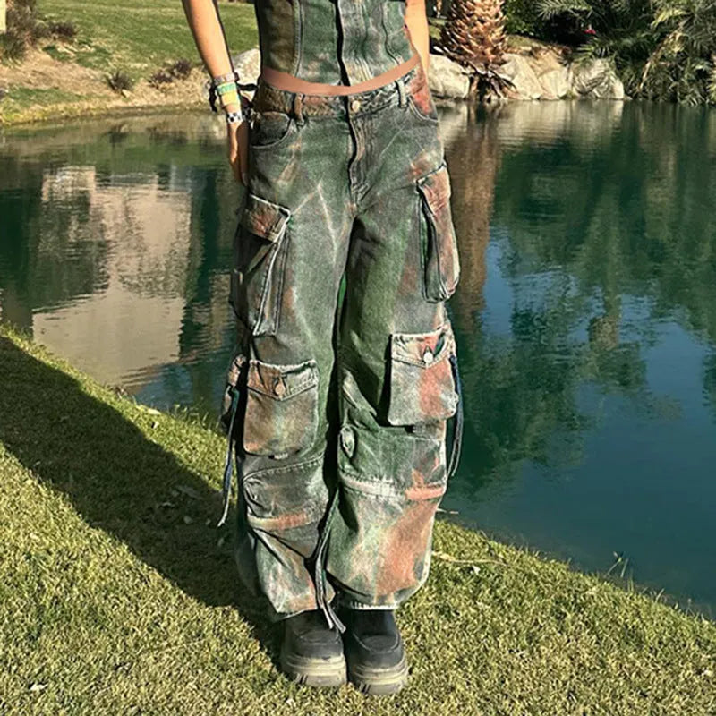Retro colour blooming loose cargo denim trousers with multiple gradient patch pockets on a model.