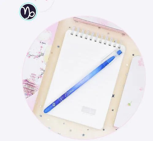 Box of 12 quick-drying gel pens with constellation designs and plastic bodies