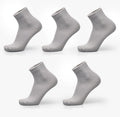 Men's bamboo fibre business socks with small square pattern in black, grey blue, iron grey, navy blue, and silver grey.