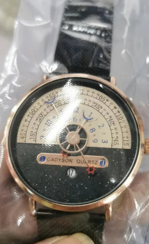 Men's gold sports watch with round 40mm dial, leather strap and onion crown