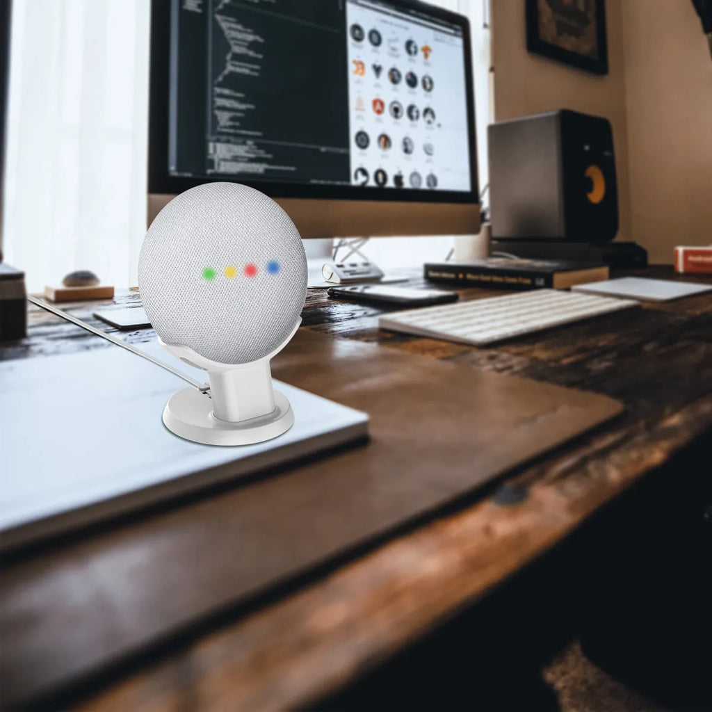 Plastic table holder for Google Home Mini voice assistant stand in black finish on a desk