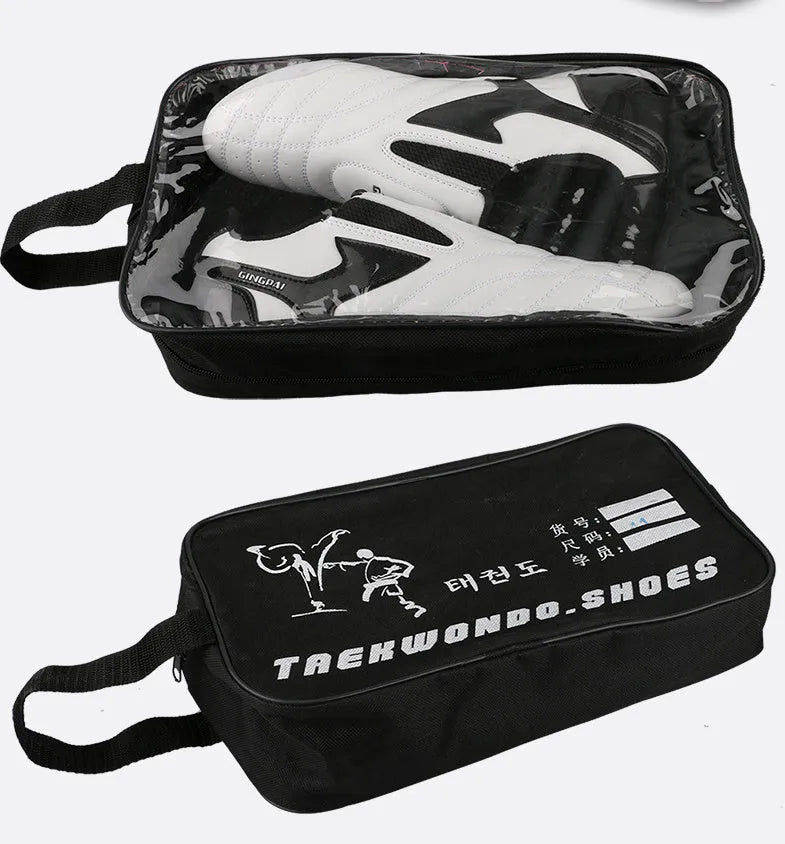 Black and white children's martial arts training shoes with soft bottom construction and widened design