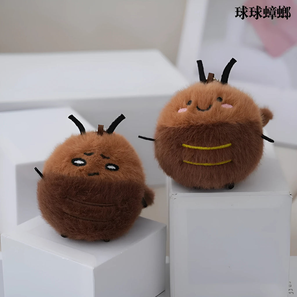 Small mink velvet cockroach pendant plush toy doll with black eyes, 8cm height, on a light background