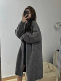 Women's medium length knitted cardigan with V-neck and long sleeves in five colour options