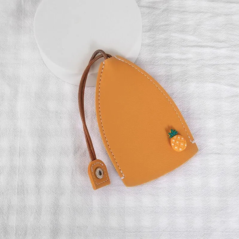 Cartoon pull-out car key case in PU leather with various design options including cactus, rabbit, and fruit themes