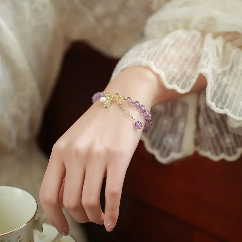 Women's lavender amethyst crystal bracelet with zodiac animal modelling in dark and light colour options