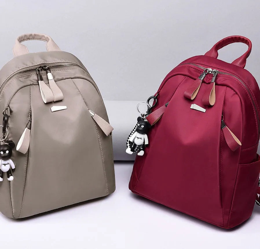 Medium wine red Oxford cloth rucksack with double straps and external digging pocket