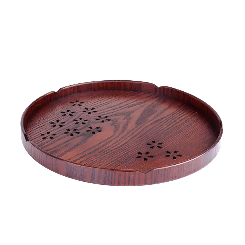 Wooden shallow plate with hollow cherry blossom design, 30cm diameter.