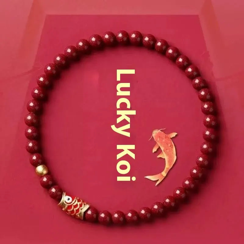 Natural cinnabar koi bracelet with golden ball design in Chinese national style