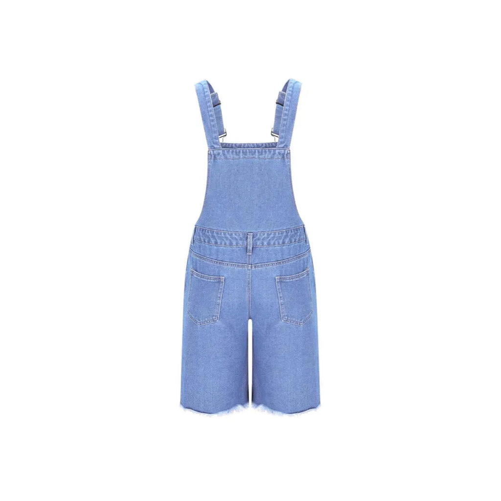 Men's ripped blue denim shorts with attached suspenders on a mid waist, straight-leg design.