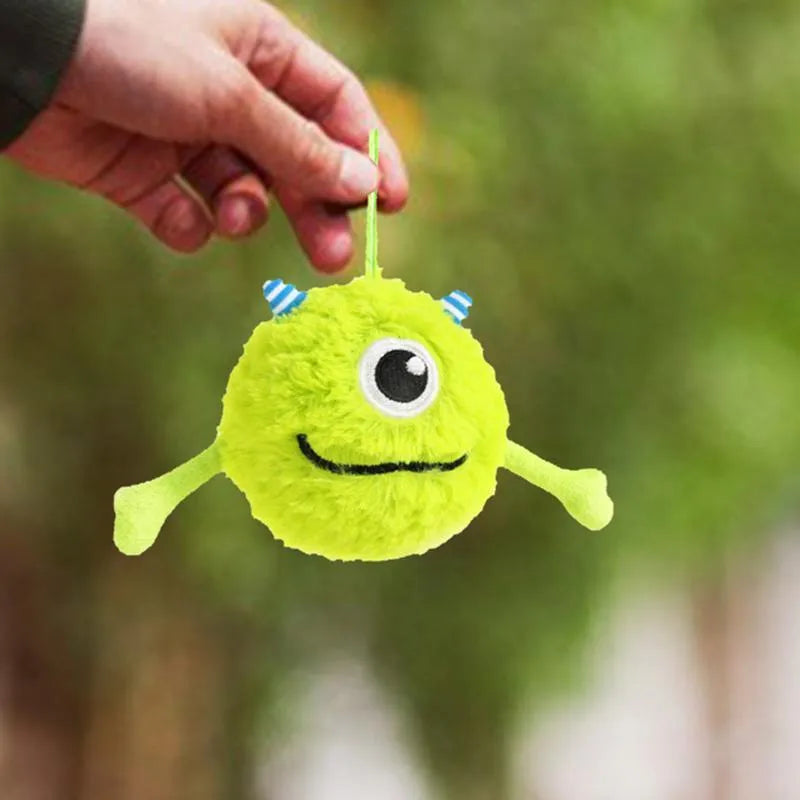 Green plush and TPR dog toy ball with sound interactive teething design