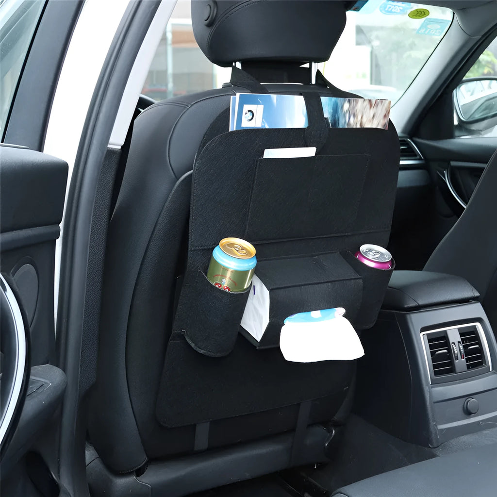 Beige car back seat storage bag with multiple felt pockets on a car seat