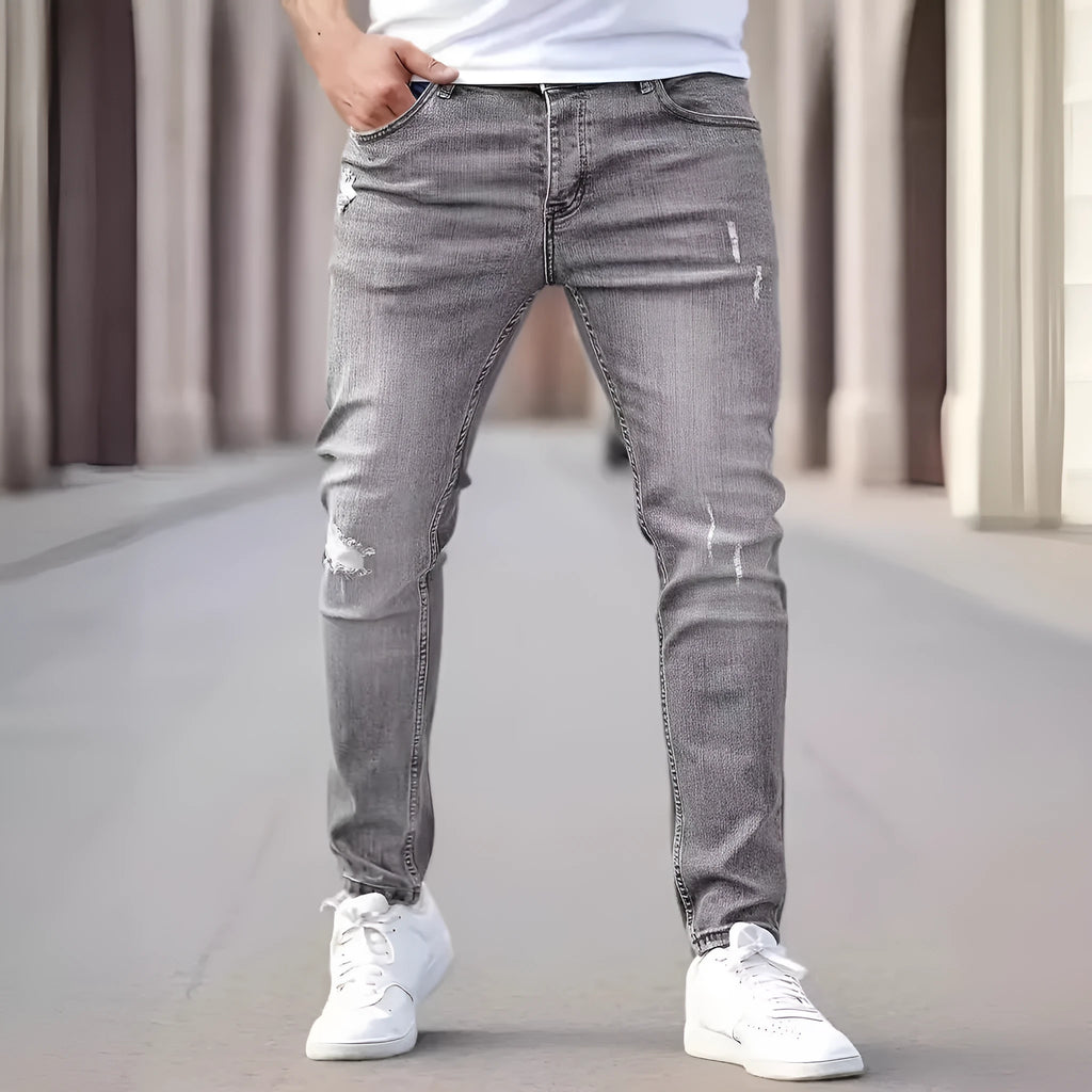 American-style slim-fit stretch denim jeans for men – mid waist, non-iron, available in black