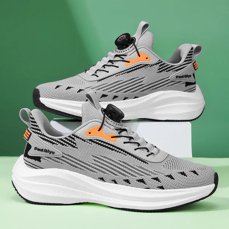 Men's white and green Fly-kit mesh running shoes with rotating buckle and TPU popcorn sole on a flat heel.