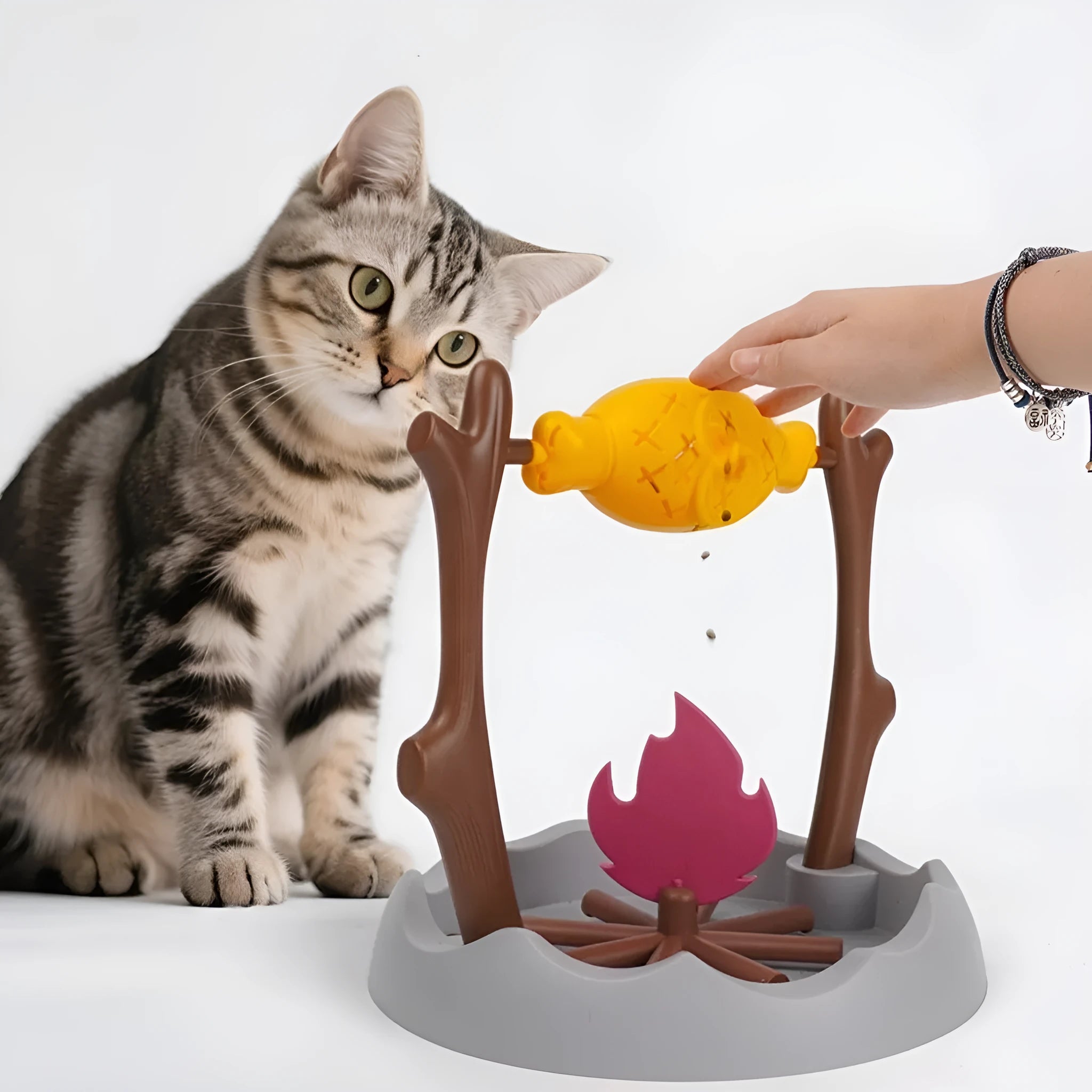 Barbecue-style cat feeder toy with tumbling design for slow feeding, dimensions 30x30x29cm