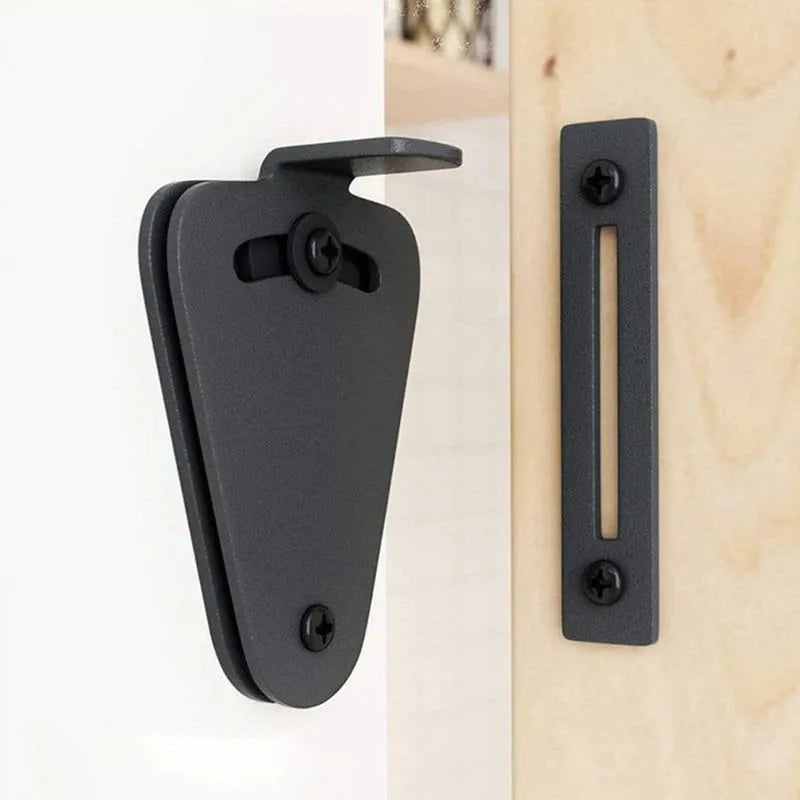 Black stainless steel sliding barn door lock shown in S and M sizes.