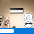 White or black magnetic rechargeable LED desk lamp with touch controls, shown on a metal surface.