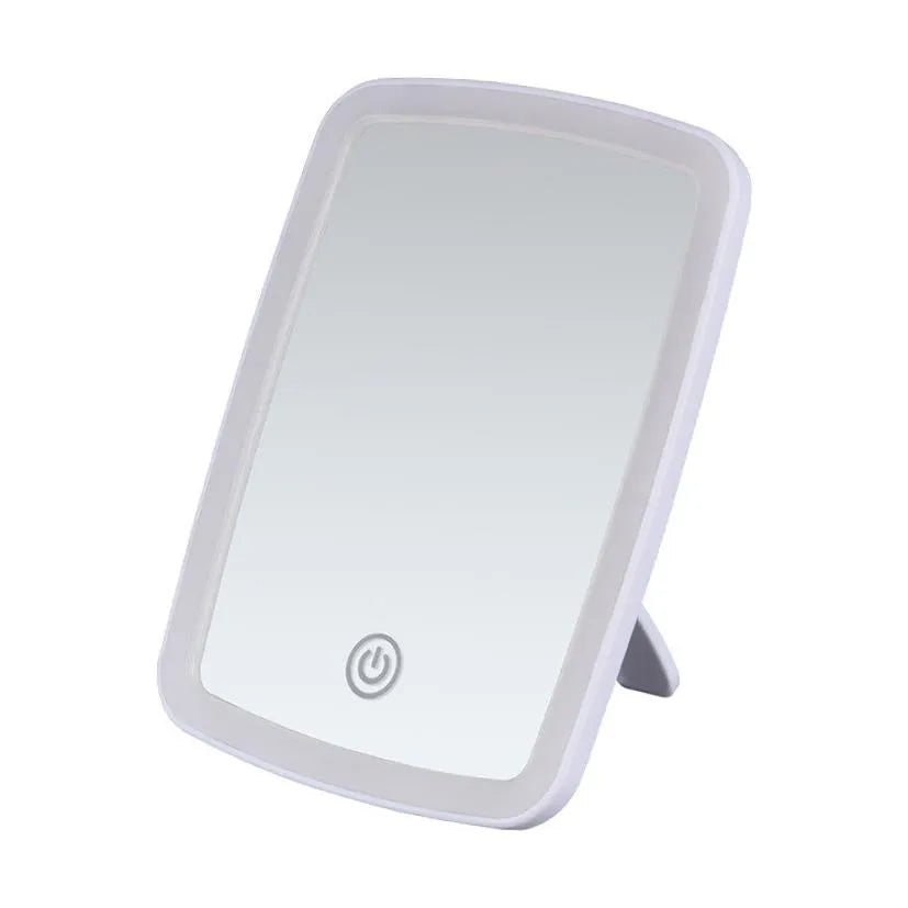 Simple desktop home LED makeup mirror with USB charging and ABS frame on a tabletop