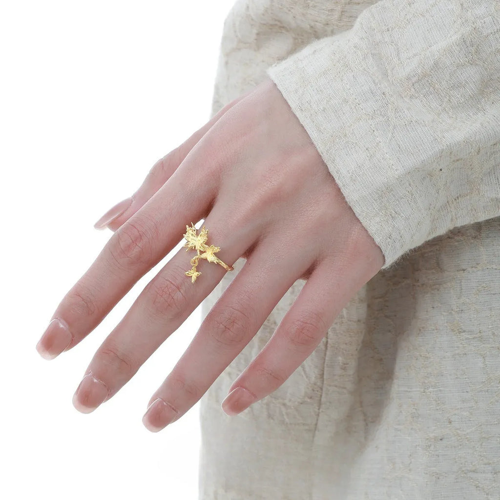 Silver butterfly ring with adjustable opening in gold-colour finish