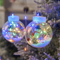Set of 10 LED Christmas curtain lights with fairy and snowman wishing ball designs on a string.