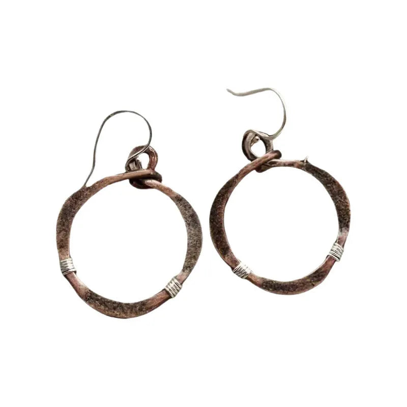 Pair of retro hollow round alloy earrings with bronze electroplated finish and geometric drop shape