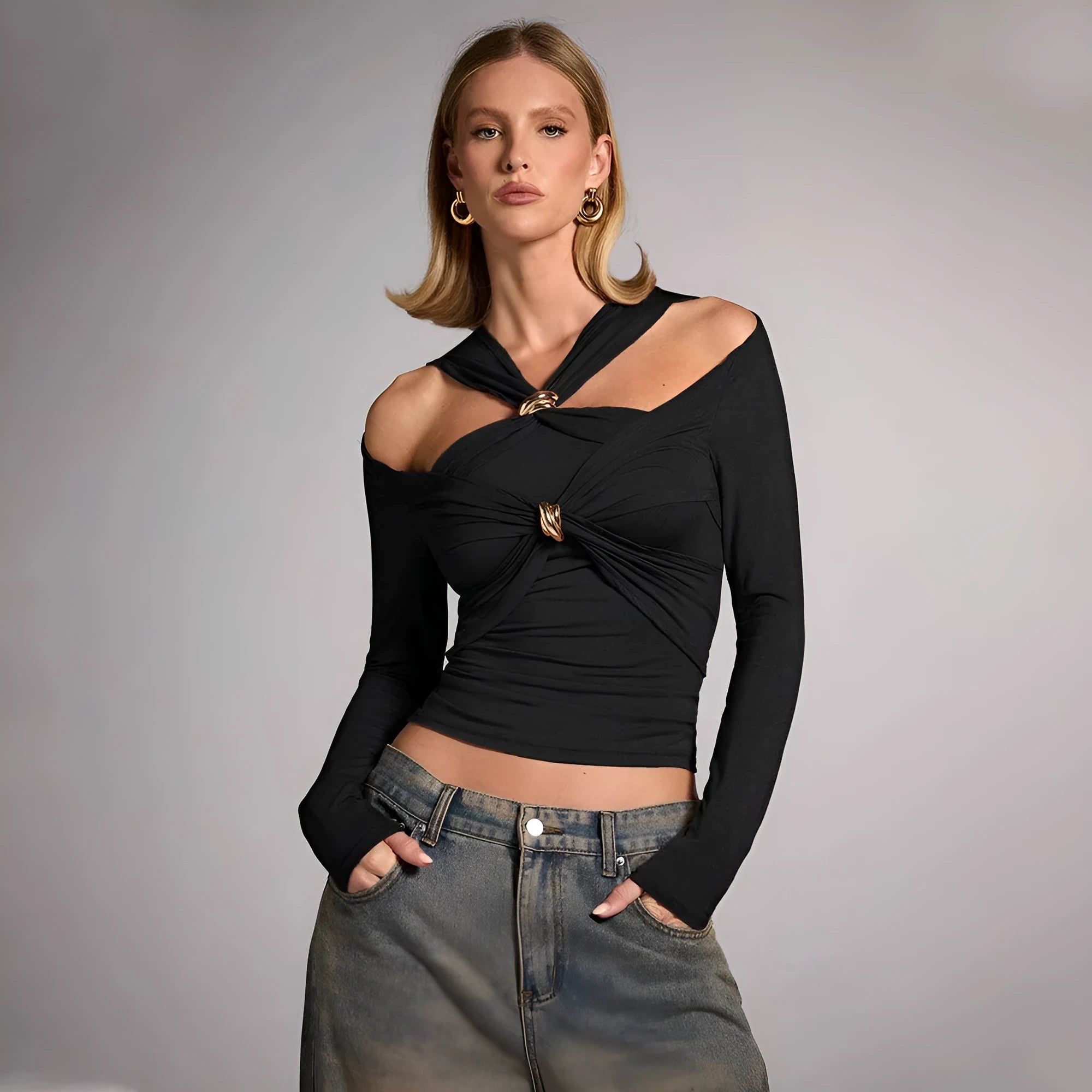 Black women's halter neck slim fit top with long sleeves on mannequin