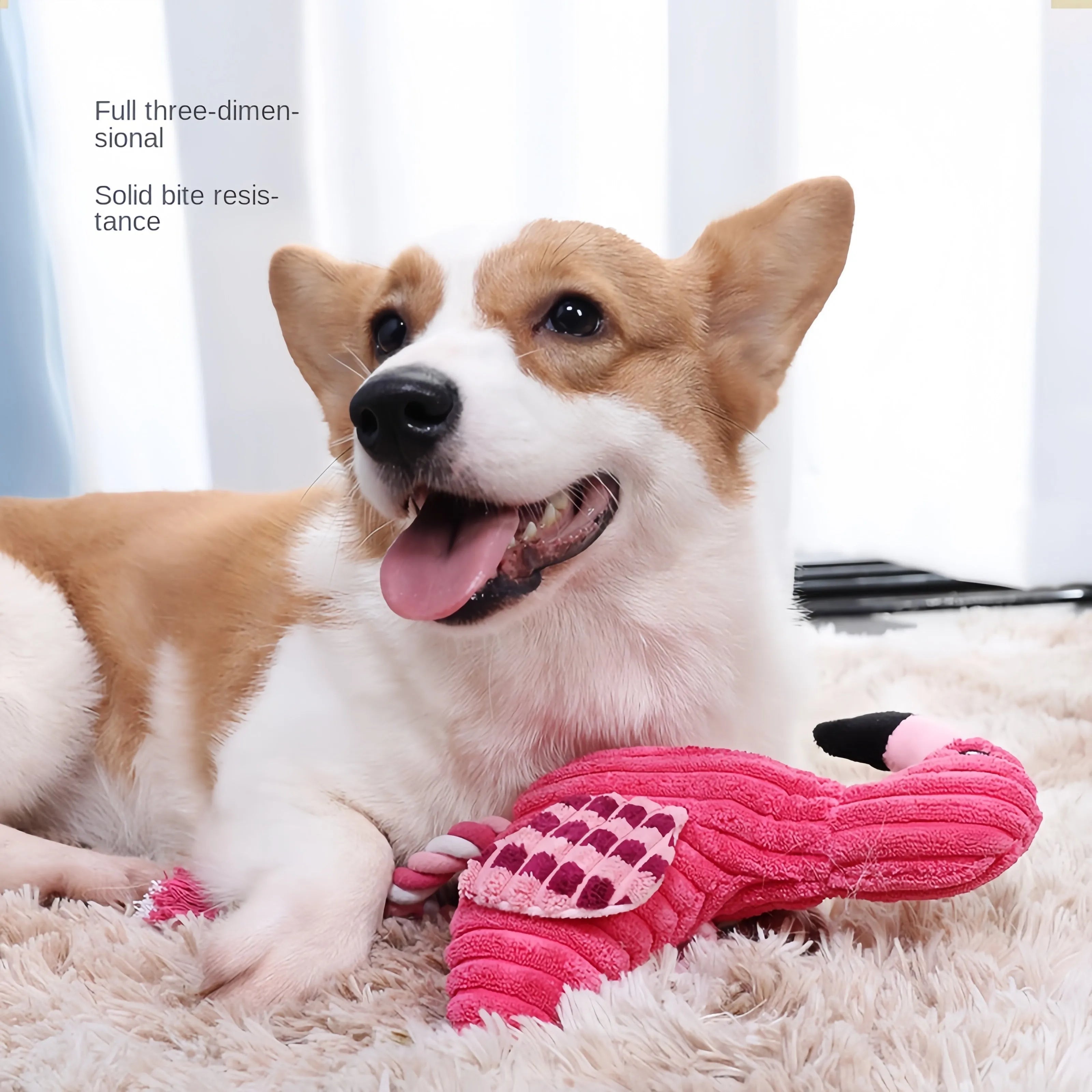 Pink corduroy animal-shaped plush dog toy with squeaker on a neutral background.