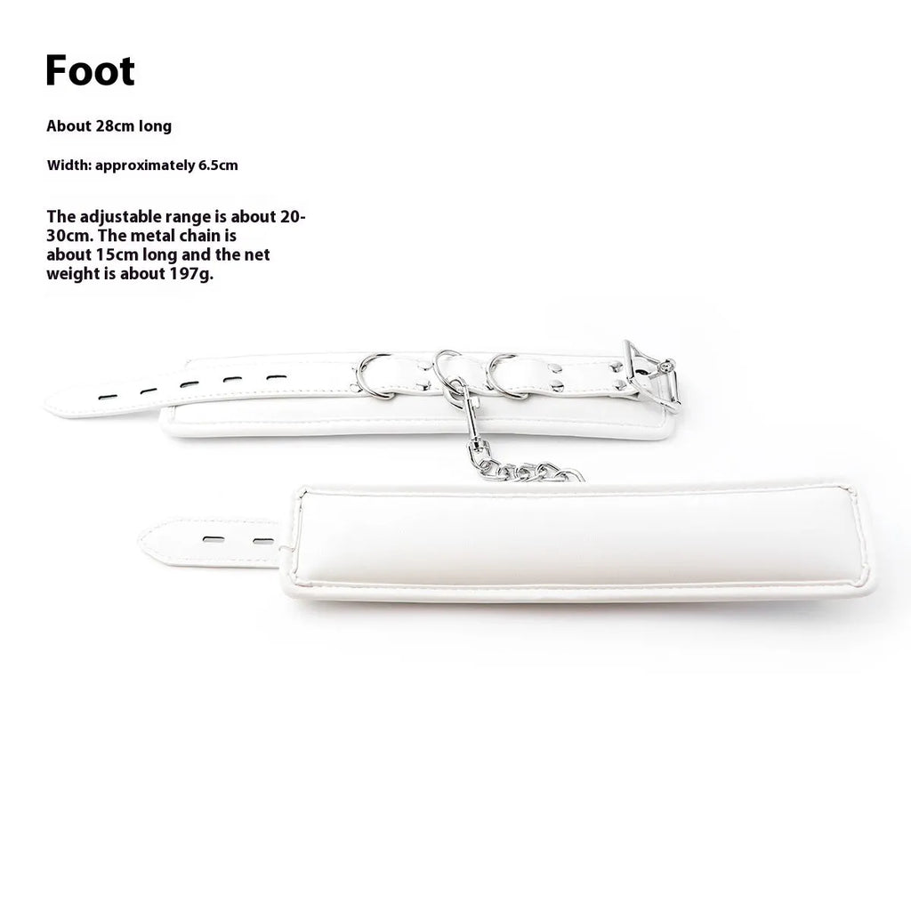 White PU sponge bondage cuff set showing handcuffs, footcuffs and neck cuff for restraint play