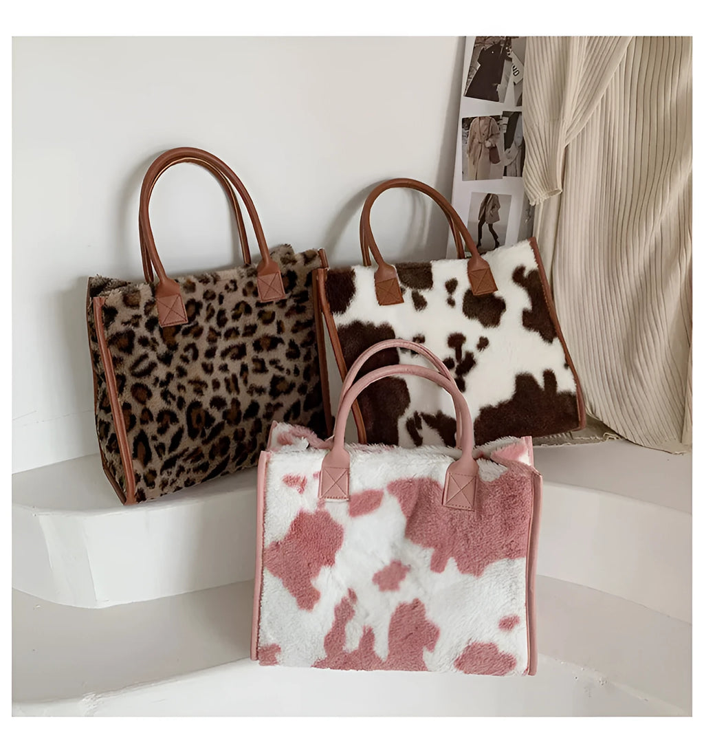 Large plush handbag with leopard print, car stitching, and magnetic buckle in Leopard Brown