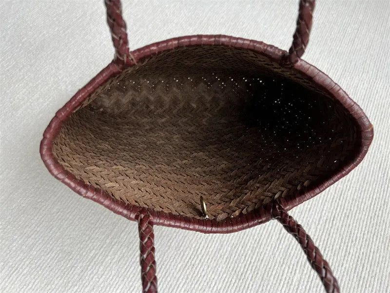 Handmade woven brown leather tote bag with three-dimensional pockets and vintage finish