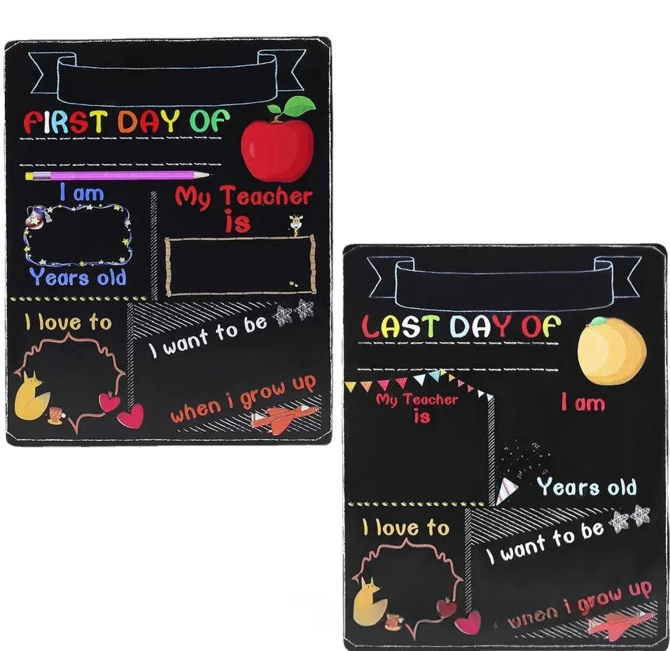 Wooden first day of school blackboard sign on a simple background.
