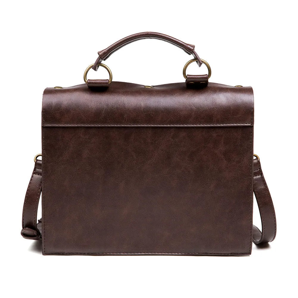 Bronze steampunk pillow shoulder bag with metal hardware on a structured square PU body.