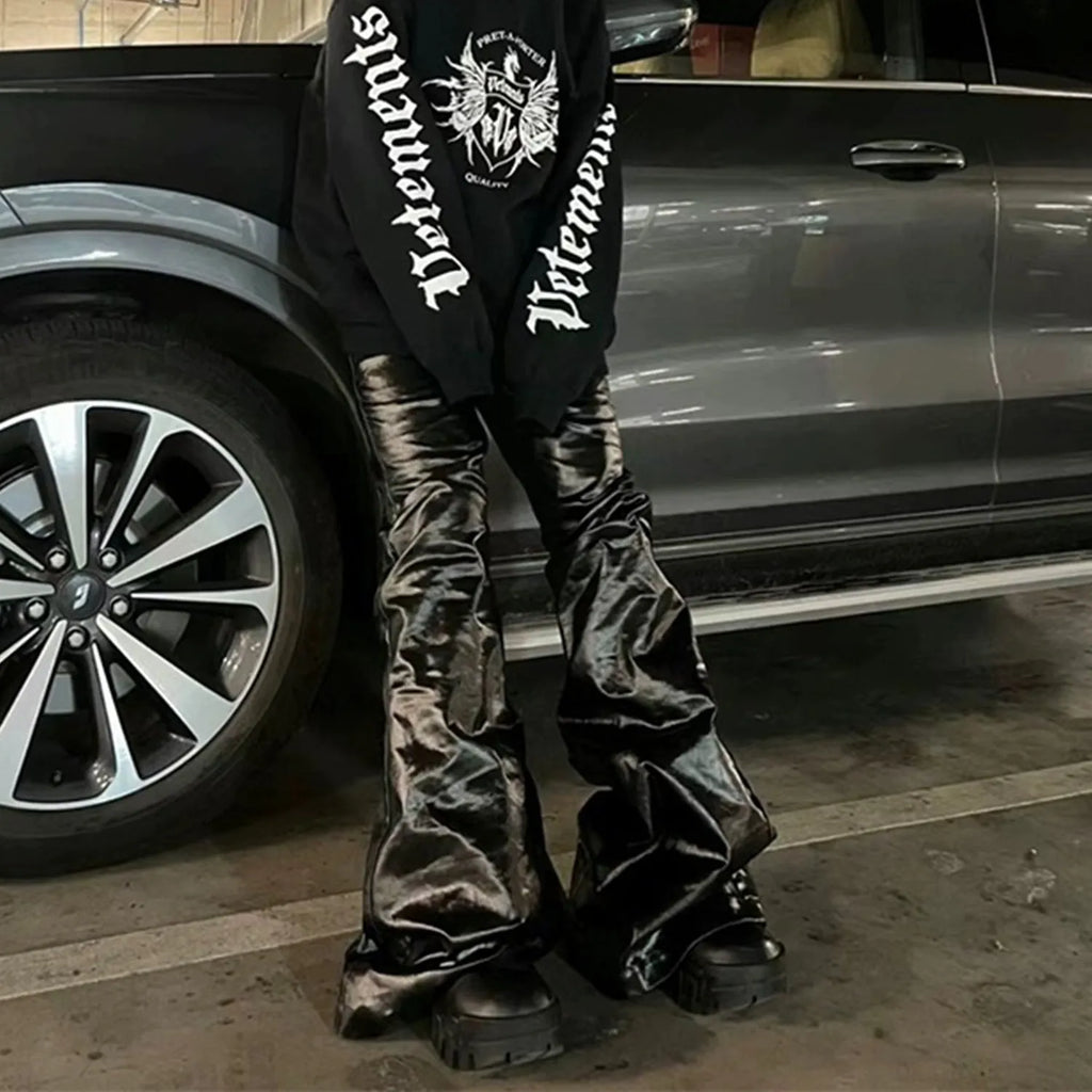 Black patent leather coated straight-leg jeans on size chart showing M L XL XXL options