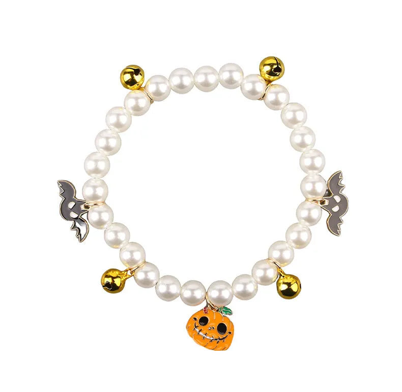 Halloween cat collar with pearl necklace decoration showing three pumpkin design variations