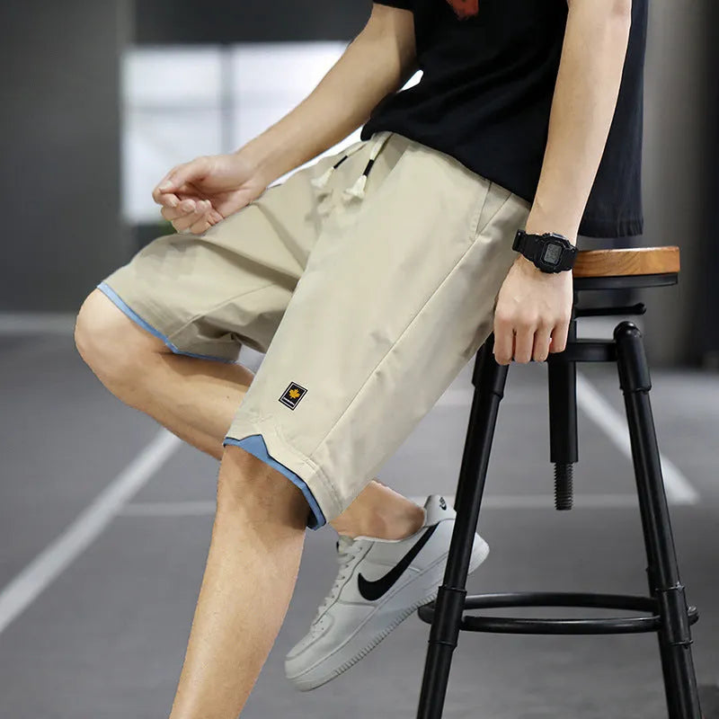Straight leg loose fit casual shorts in polyester fabric available in multiple colours and sizes
