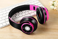 Foldable wireless Bluetooth headset with adjustable hinges in blue, red, or rose red colours
