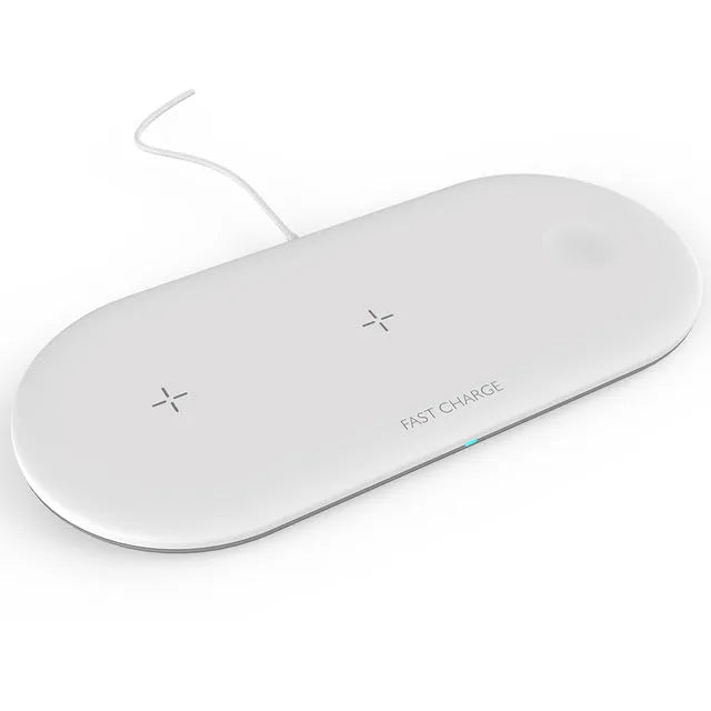 White three-in-one wireless charging station for Apple iPhone, iWatch, and earbuds on a desk.