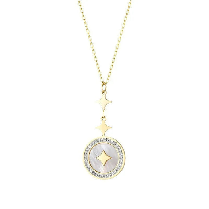 Gold titanium steel women's necklace with hexagonal star pendant on O-ring chain.
