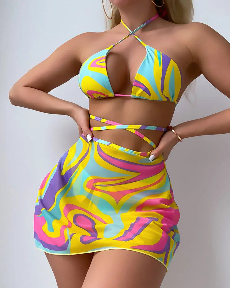 Yellow striped halter-neck lace-up bikini top with matching skirt and shorts.