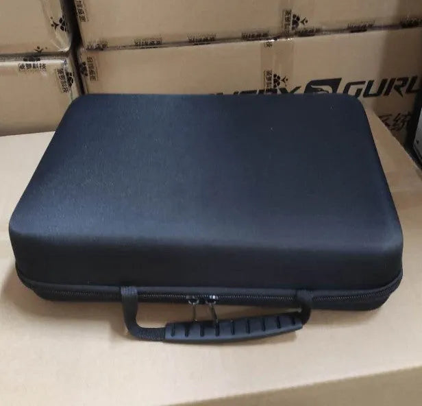Black and white muscle massage gun with a 12mm stroke on a grey background